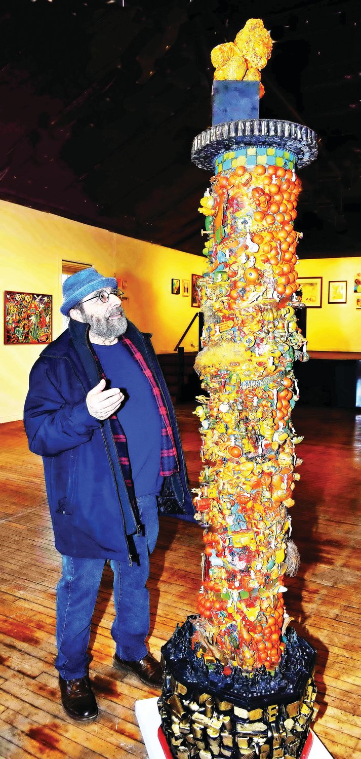 Joseph Schembri with sculpture by Guy Ciarcia, titled “Gabe’s Column” in mixed media.