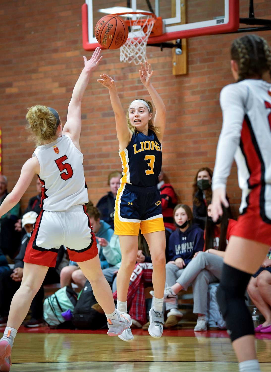 New Hope’s Madi Fasti gets a clean look for a jump shot in front of Gwynedd Mercy’s Maddie Newell.