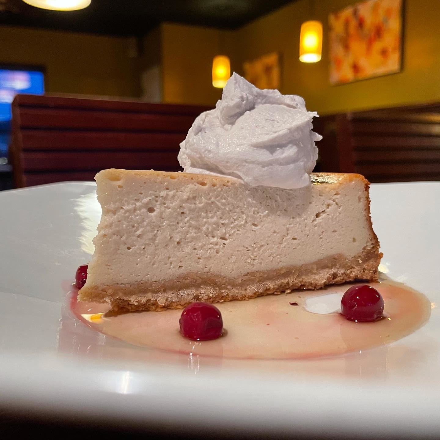 Toppings and crusts may vary on the award-winning cashew cheesecake made by Sprig & Vine pastry chef Linda Monastra, but the dessert is always a favorite.