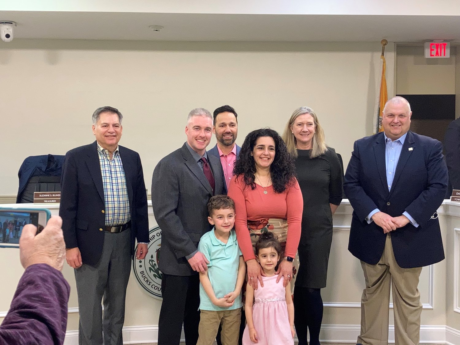 Lower Makefield Township’s new Fire Services Director Tim Chamberlain, second from left, stands with his wife, Michelle, and their two young children Andrew and Audrey at the March 16 supervisors meeting. In the back row, from left, are Supervisors Fredric Weiss, James McCartney, Suzanne Blundi and John Lewis.