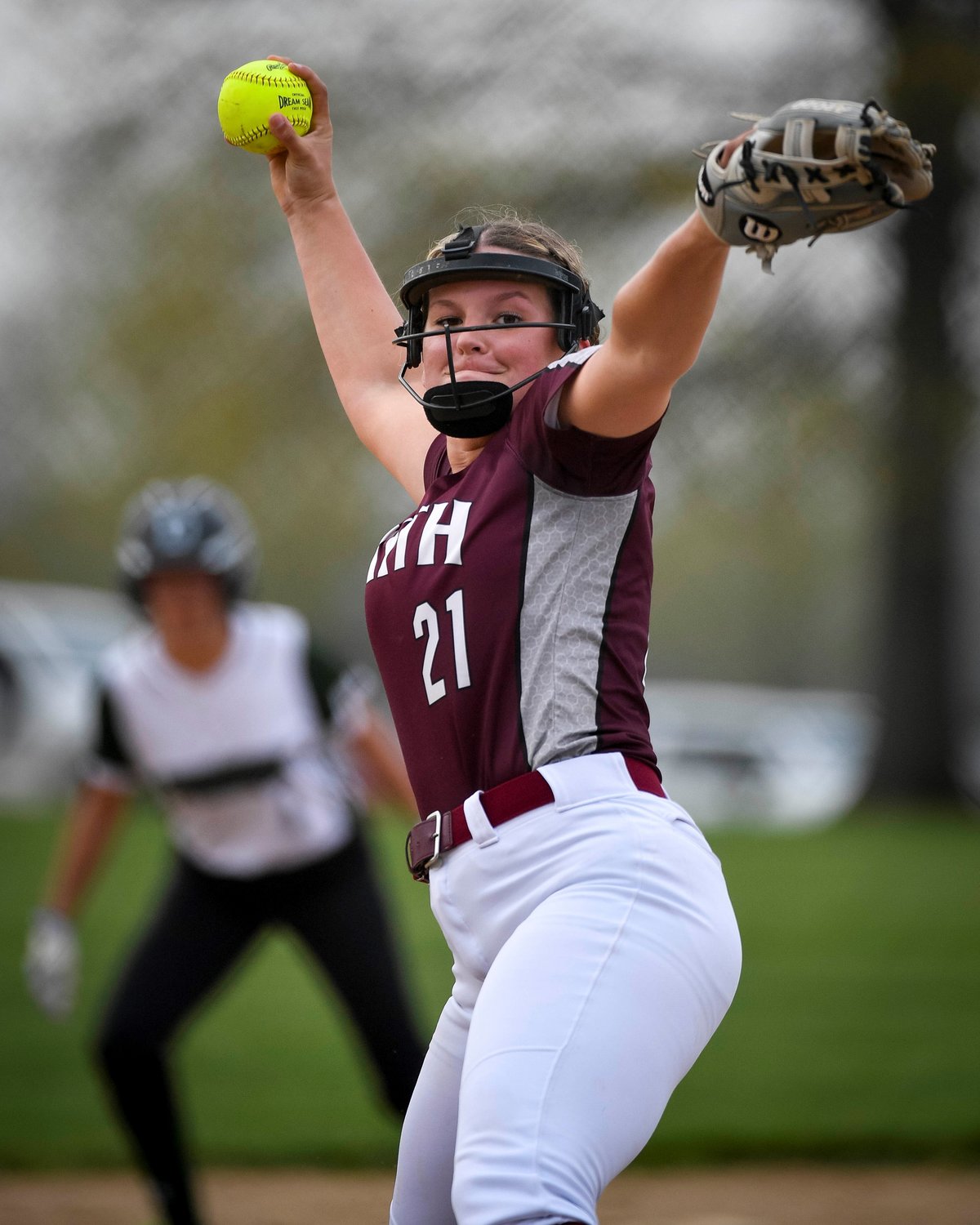 Faith’s Morgan Pepkowski, pitching in relief, winds up and delivers a pitch in the third inning.