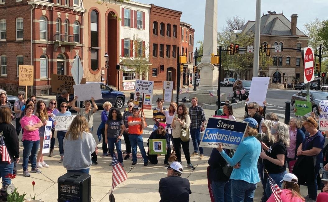 More than 100 people gathered outside the former Bucks County Courthouse in Doylestown Tuesday to call for reproductive rights, in the wake of a leaked Supreme Court document saying Roe v. Wade should be overturned.