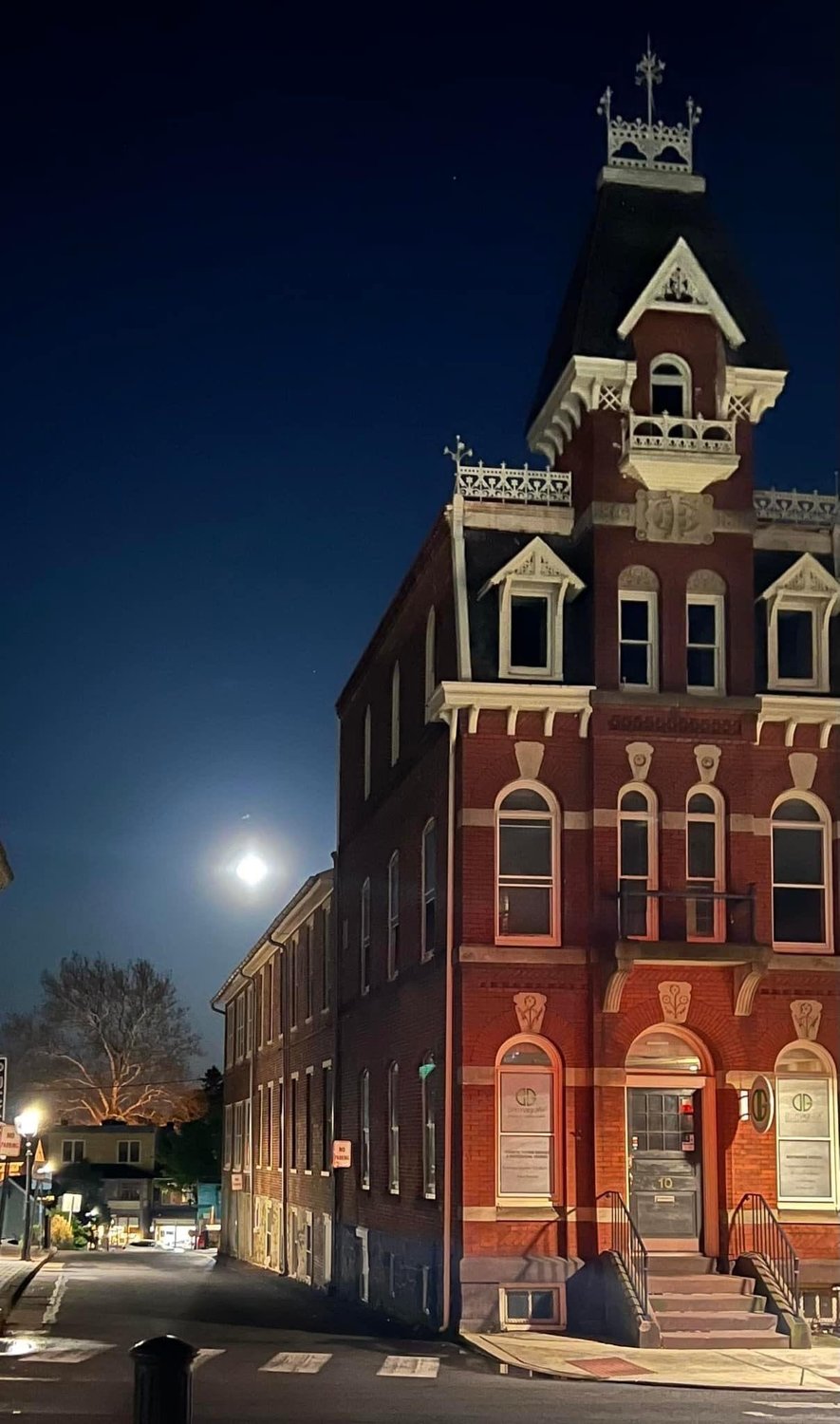 Moonrise in Doylestown Monday night casts a spell on Court Street in Doylestown. It was the night after a Superflower Blood Moon, a total lunar eclipse.