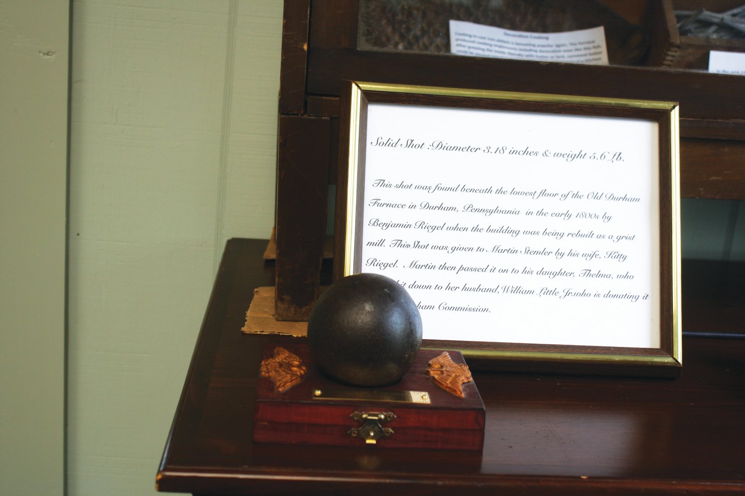 A 5.6-pound cannonball from the Colonial Durham Iron Works and a handmade box containing two handmade nails were donated to the Durham Historical Society.