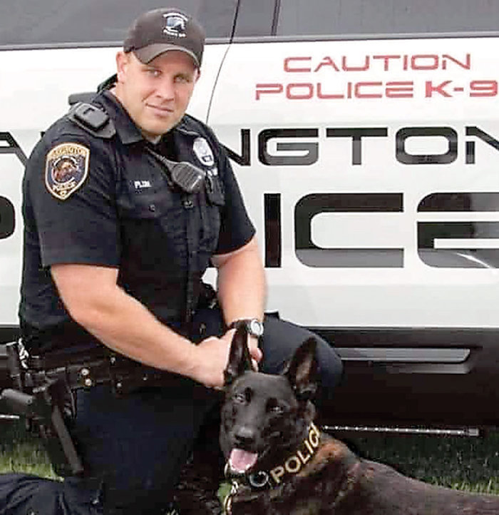 Warrington Township Police K9 Officer Stephen Plum Jr. with his canine partner, Murphy.