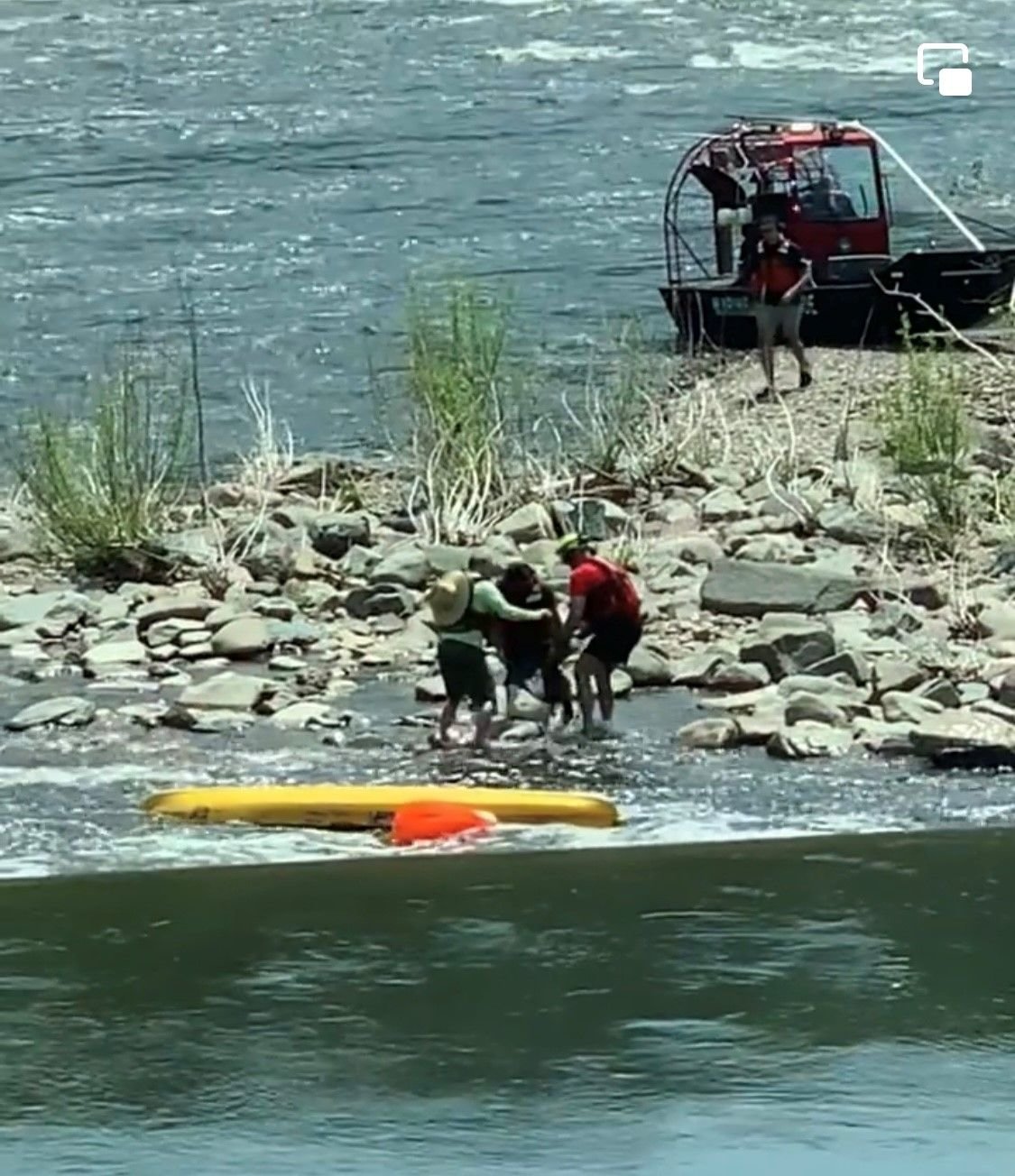 Rescuers come to the aid of kayakers in the Delaware River in New Hope after one overturned.