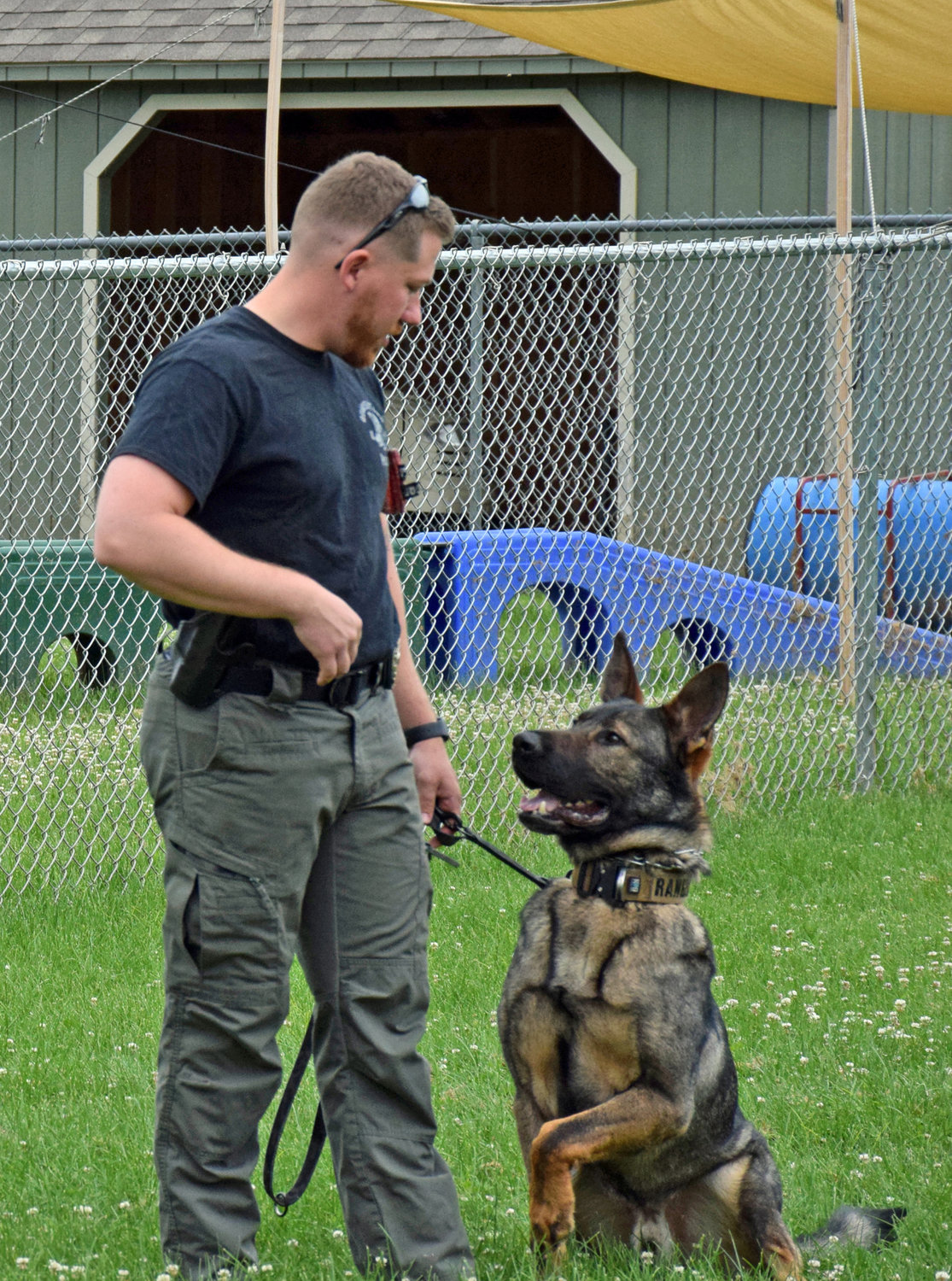 Officer Tyler Fahringer of the Quakertown K-9 Unit conducts a demonstration with K-9 Ranger.