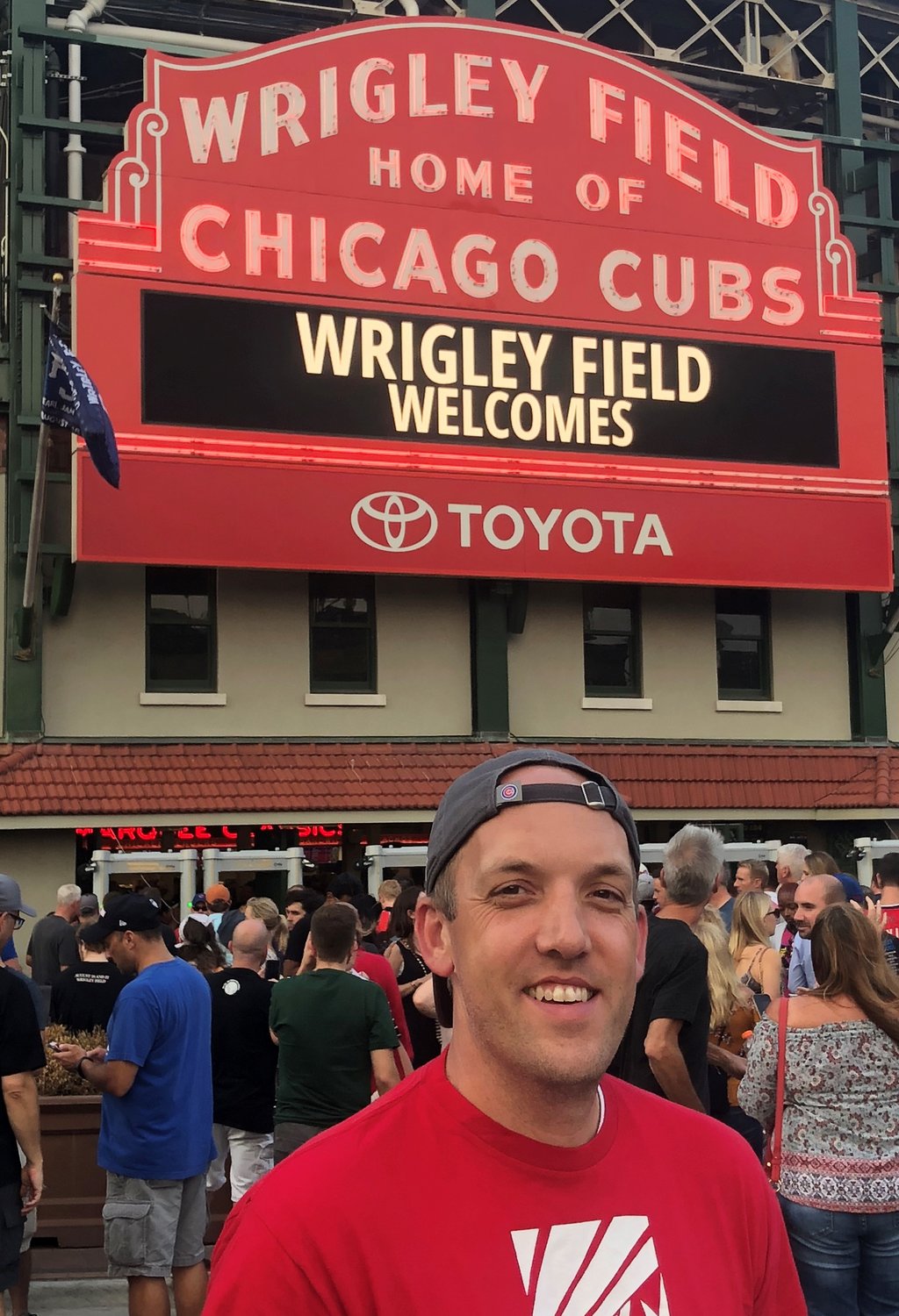 Rob Eichem, a Cubs fan, stands outside Wrigley Field.