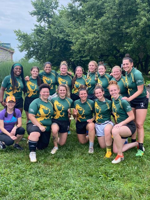 The Doylestown women’s rugby team celebrates winning the Cheesesteak 7s Tournament on July 9 in Wilmington, Del.