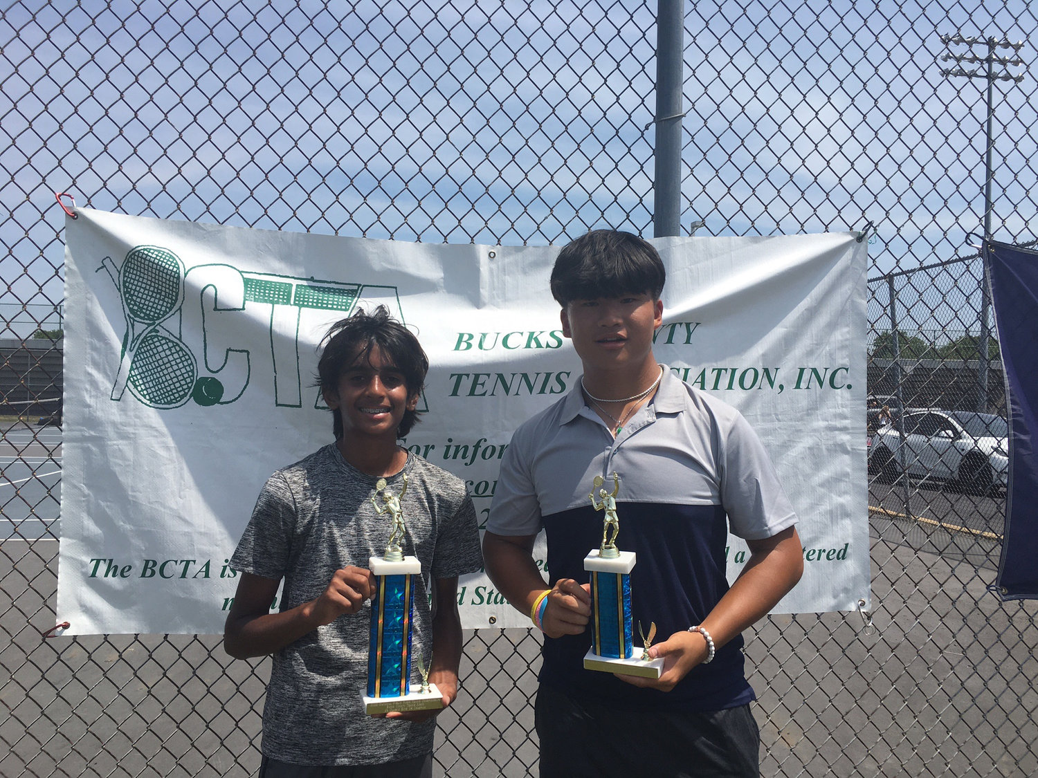 Boys 14 Blue Division champion Shea Patel, left, and finalist Kaiser Zhao.