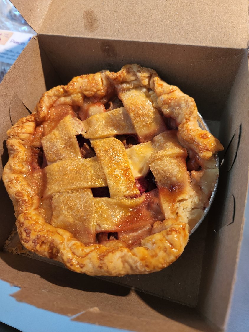 In addition to produce, there are homemade baked goods including homemade pies by M&E Edibles. This one is peach.
