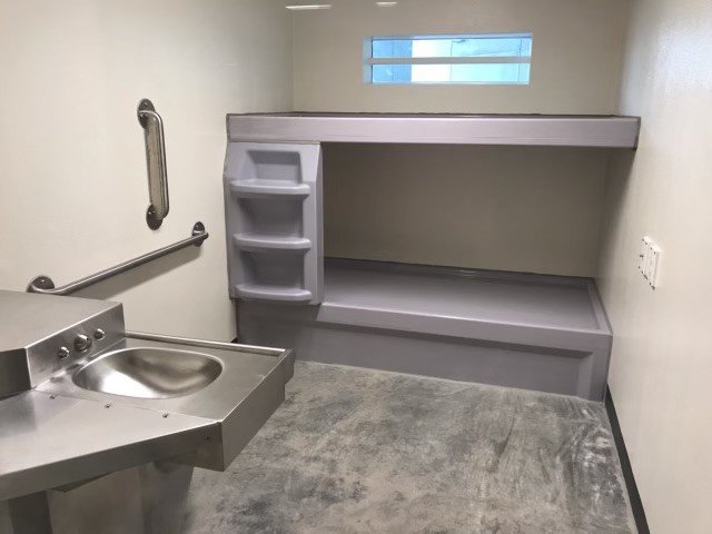 Newly designed cells in the jail's new building are built to prevent suicides, as they have no place to attach a ligature – a device used for hanging. The new facility is expected to open this fall.