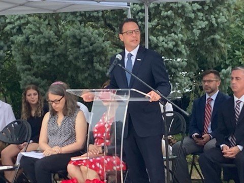 Pennsylvania Attorney General and gubernatorial candidate Josh Shapiro reads the names of the non-Bucks County Pennsylvania victims of the Sept. 11, 2001 terrorist attacks during a remembrance ceremony at the Garden of Reflection in Lower Makefield Township.