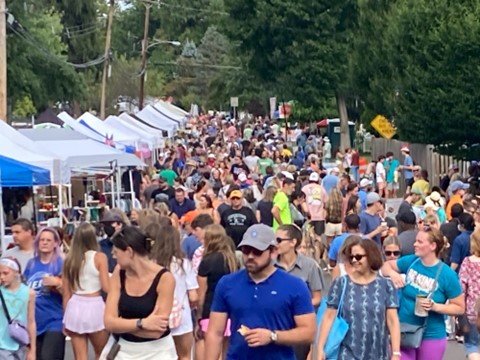 East College Avenue in Yardley Borough is packed with people during the Harvest Day Festival.