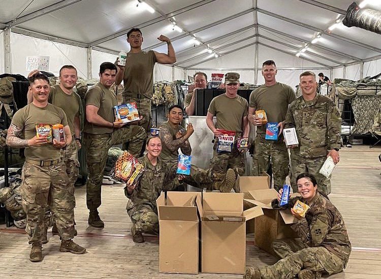 Troops receive their Operation Eternal Gratitude care packages.