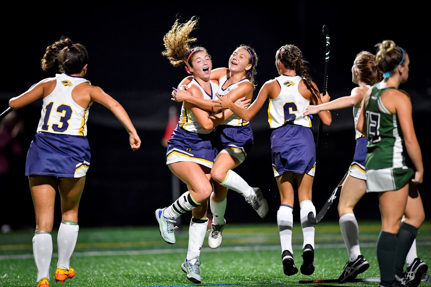 New Hope-Solebury celebrates after the game-winning goal in overtime.