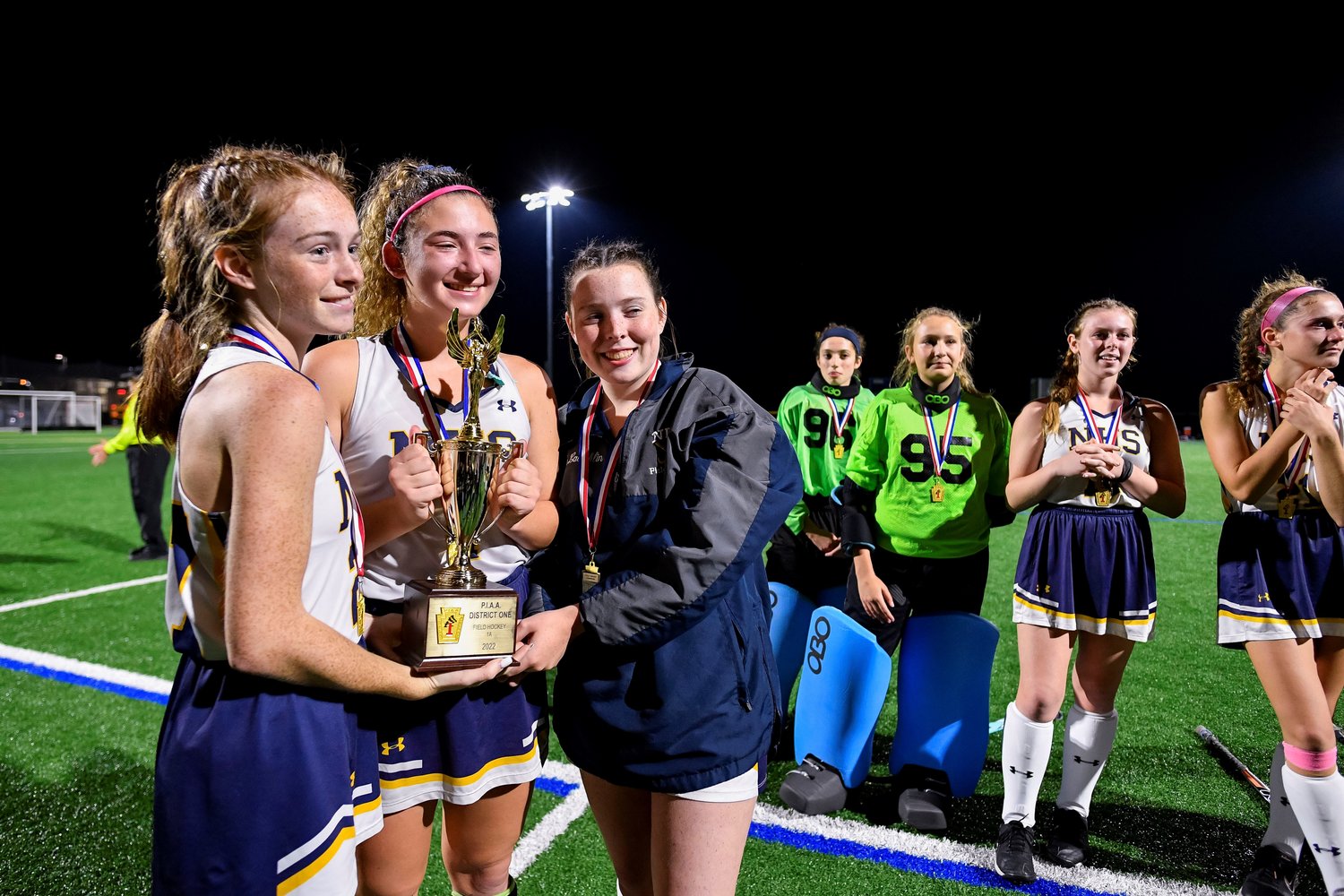 New Hope-Solebury captains hold the championship trophy.