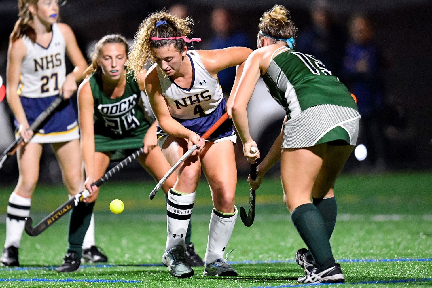 New Hope-Solebury’s Sophia Cozza battles for a loose ball in between Dock’s Erin Milesand and Olivia Zaskoda.