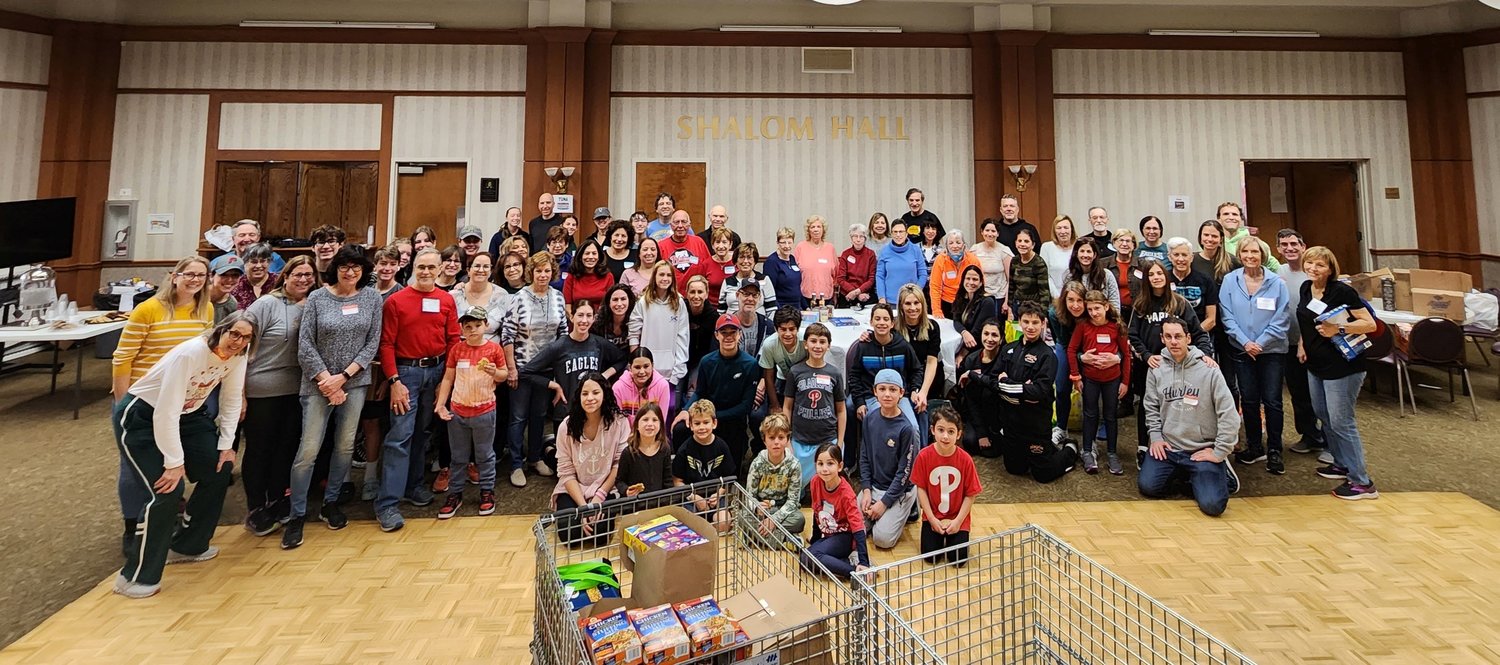 More than 200 volunteers at Shir Ami Reform Synagogue of Newtown weighed and packed over 15,000 pounds of food to be donated to area hunger relief agencies. It was their largest collection drive to date.