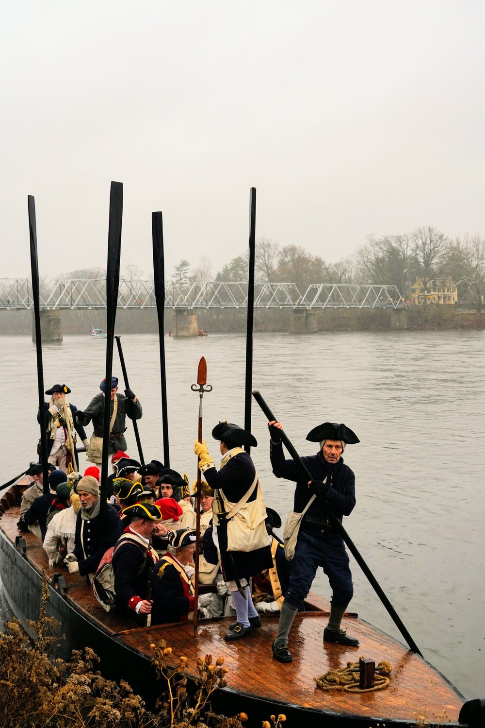 One of three Durham boats that navigated the Delaware in the rehearsal for the annual Christmas Crossing that took place Dec. 11 battled a strong current as it reached the New Jersey shore. A crowd of well-wishers greeted the reenactors after they crossed from Pennsylvania. The annual event recalls the historic crossing of the river on Christmas 1776 by George Washington and his troops, who turned the tide of the American Revolution. 