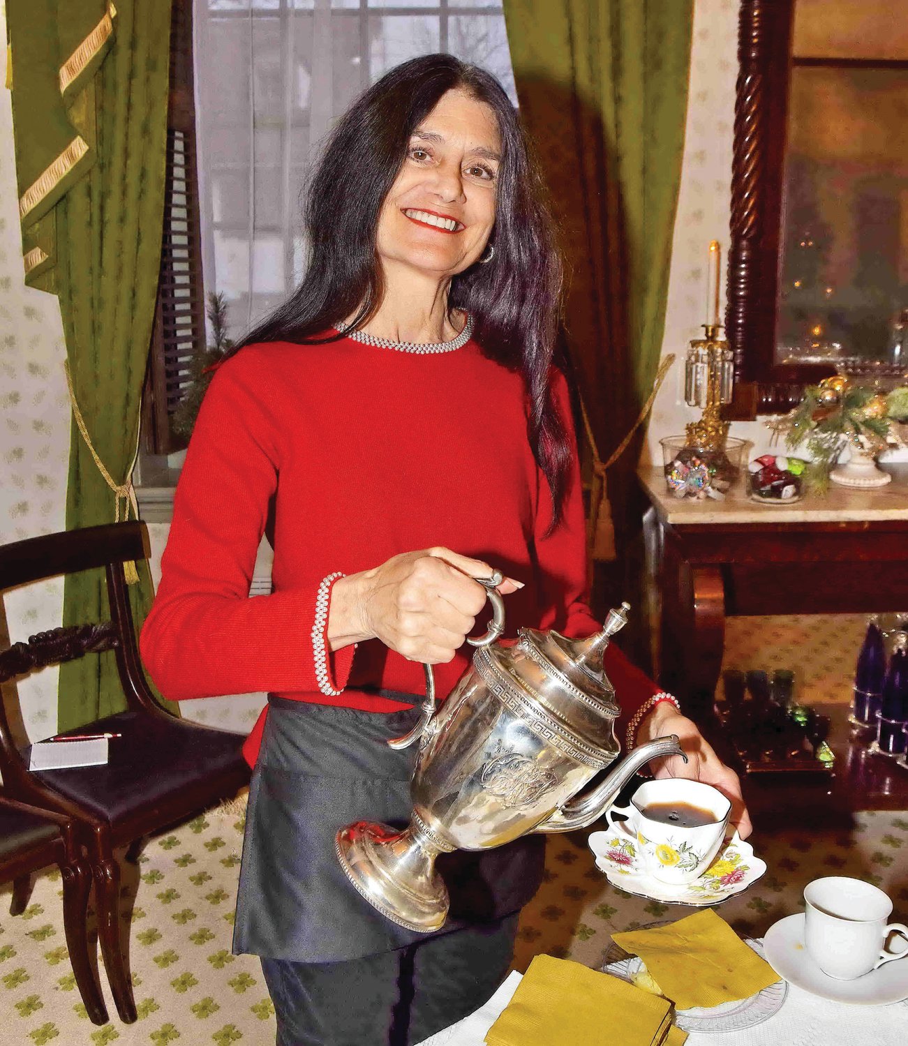 Michele Gunnells serves the “Spirited” Tea.