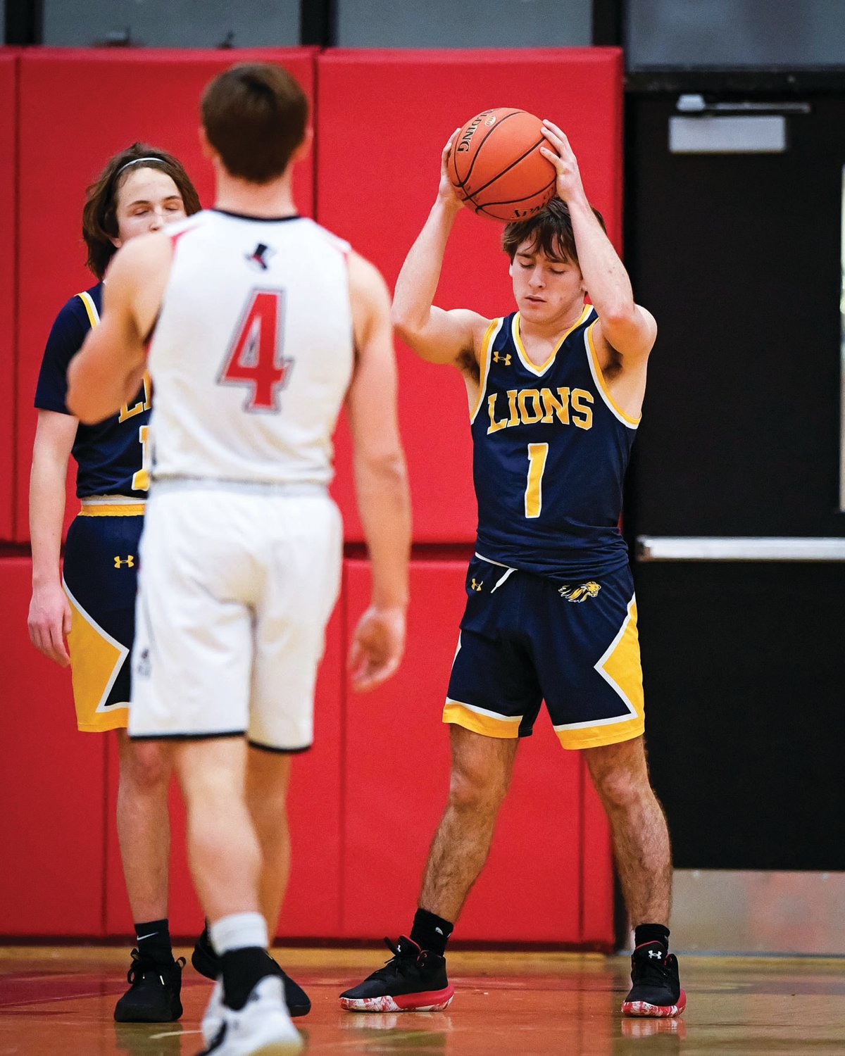 New Hope-Solebury’s Jon Wilson reacts to a foul after a rebound.
