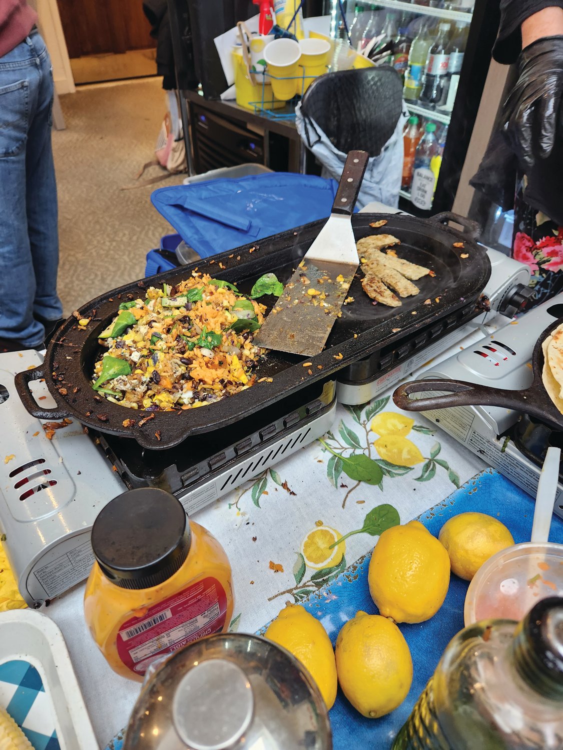Breakfast burritos are made by Macungie Mountain Herb Farm, offering breakfast along with many regionally made and grown foods at the winter Wrightstown Farmers Market.
