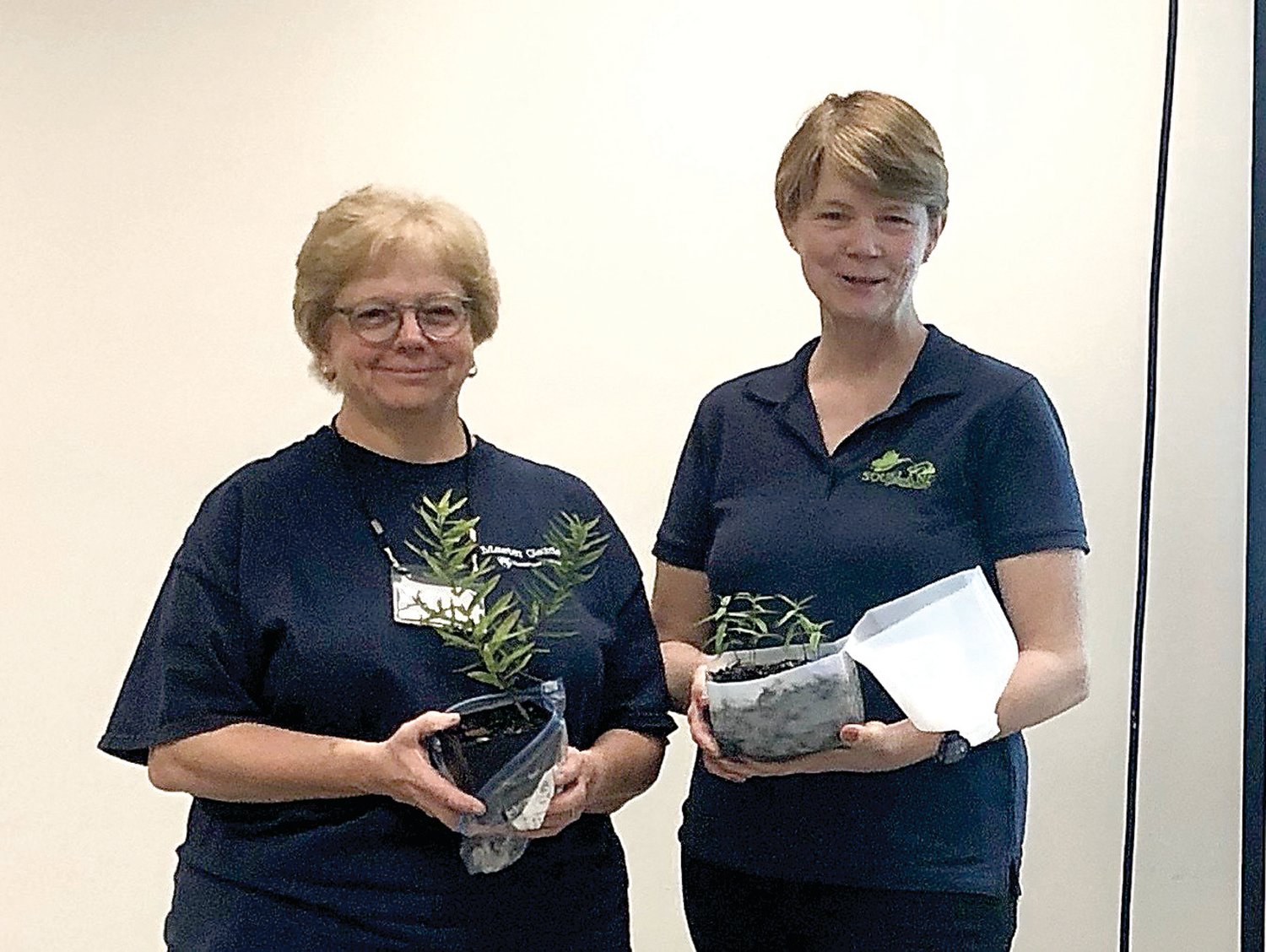 Carole Fay and Laurie Cleveland after a successful winter sowing event last fall.