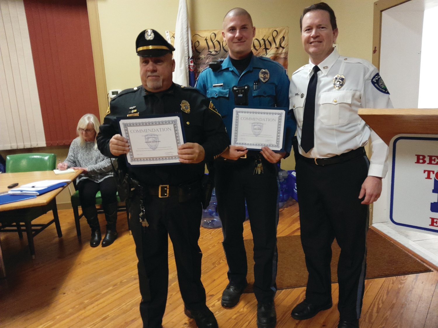 Dublin Borough Sgt. William Kirk, left, and Bedminster Township Police Officer James Zukow, center, were honored at the Jan. 11 Bedminster supervisors meeting by Bedminster Police Chief Matt Phelan for aiding a baby who’d stopped breathing while at a local supermarket.