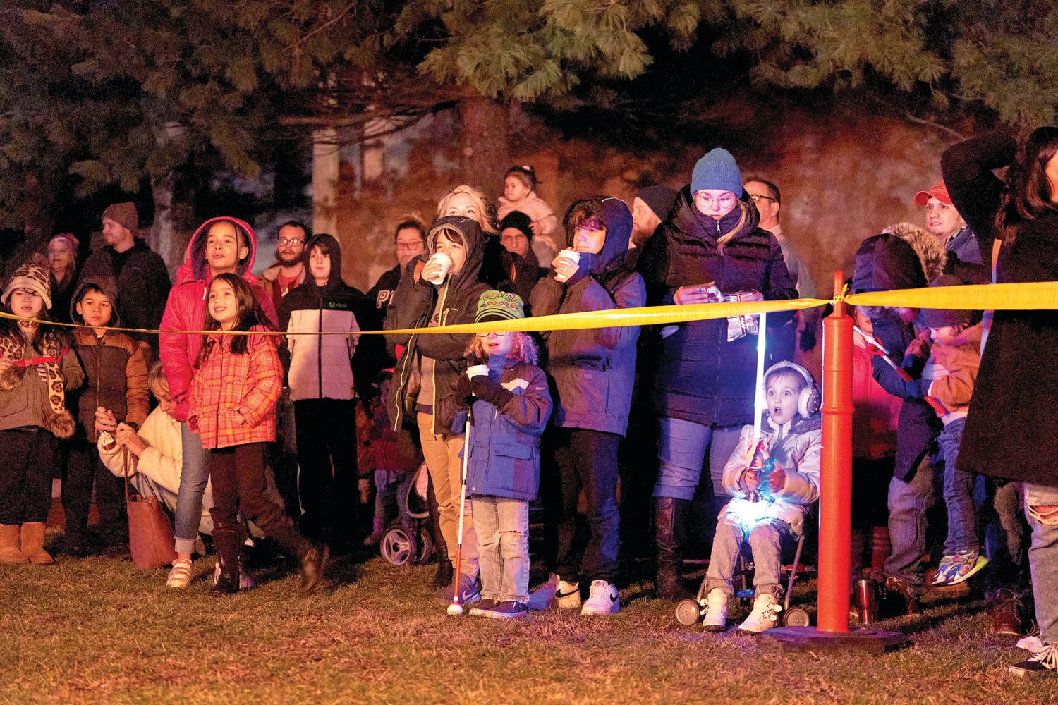 Attendees watch the fire performance at Bristol’s Mill Street Fire & Ice Event Friday, Jan. 20, 2023, in Bristol Borough.