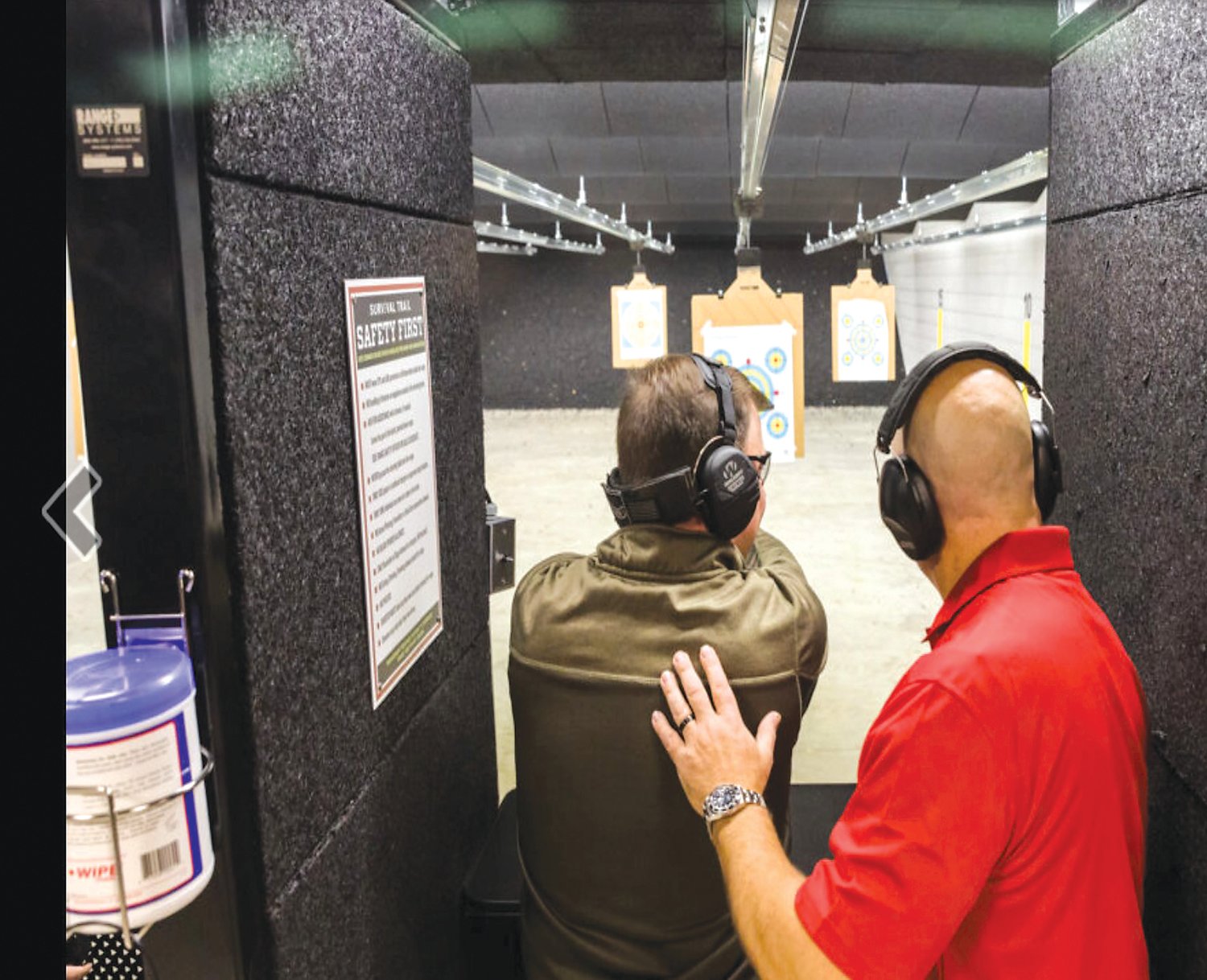 CONTRIBUTED PHOTO
Instructor Mark Snyder works with Dan Creighton, an employee at Survival Trail in Plumsteadville, on the store’s shooting range. Survival Trail has developed a range of training classes to help new and seasoned gun owners safely handle their firearms and hone their skills.