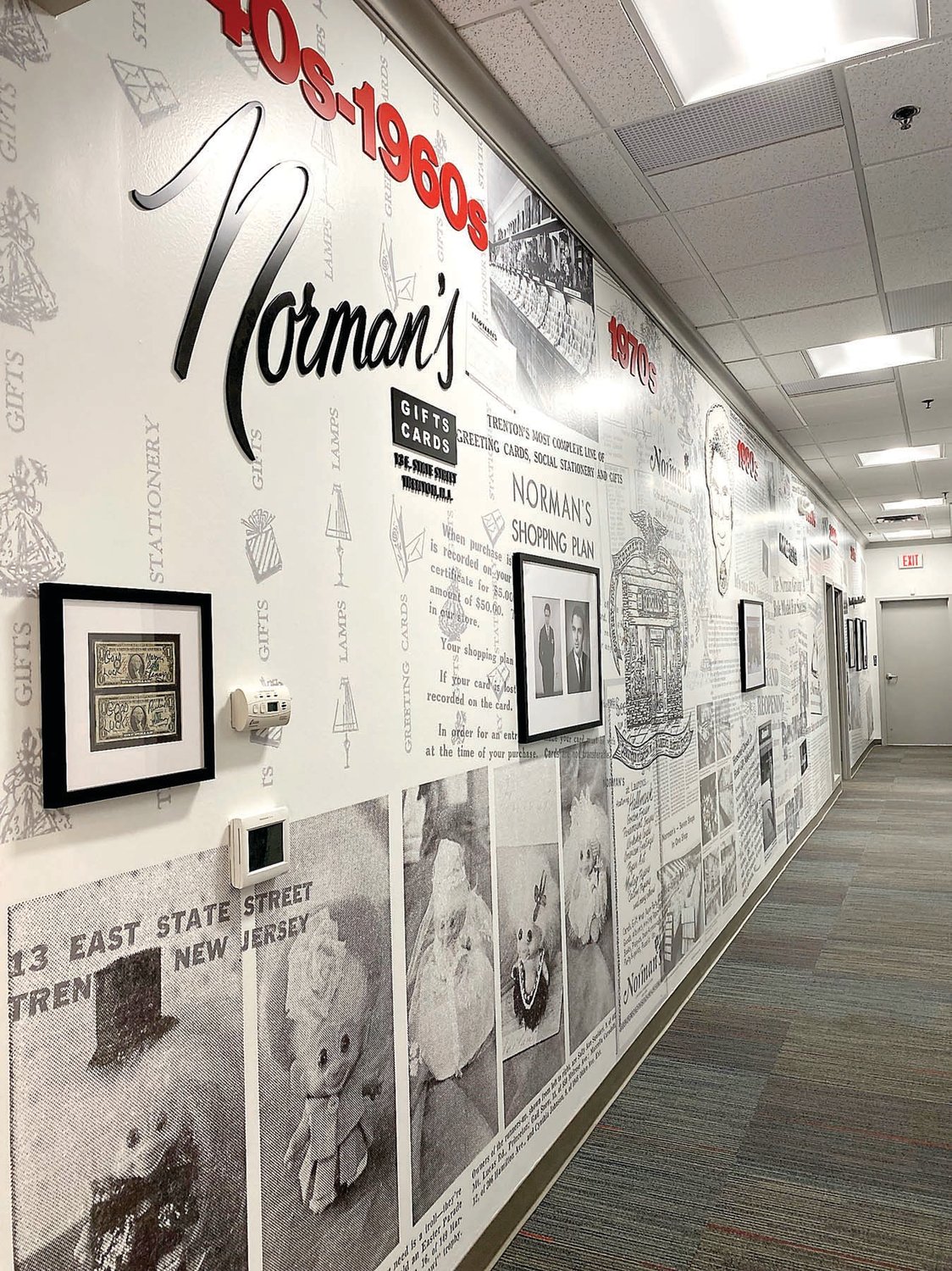The newly unveiled legacy wall at Norman’s Hallmark headquarters in Newtown provides a veritable walk through time spanning more than eight decades.
