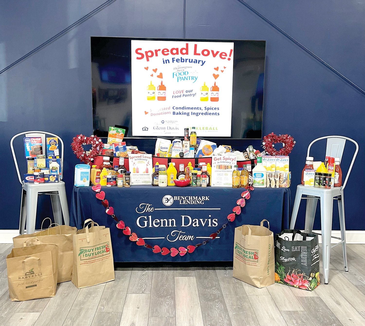 Benchmark Lending and Flemington Pickleball Club are collecting donations for the “Love our Food Pantry” food drive this February to benefit the Flemington Area Food Pantry. Pictured are donations from the inaugural Love our Food Pantry event in 2021.