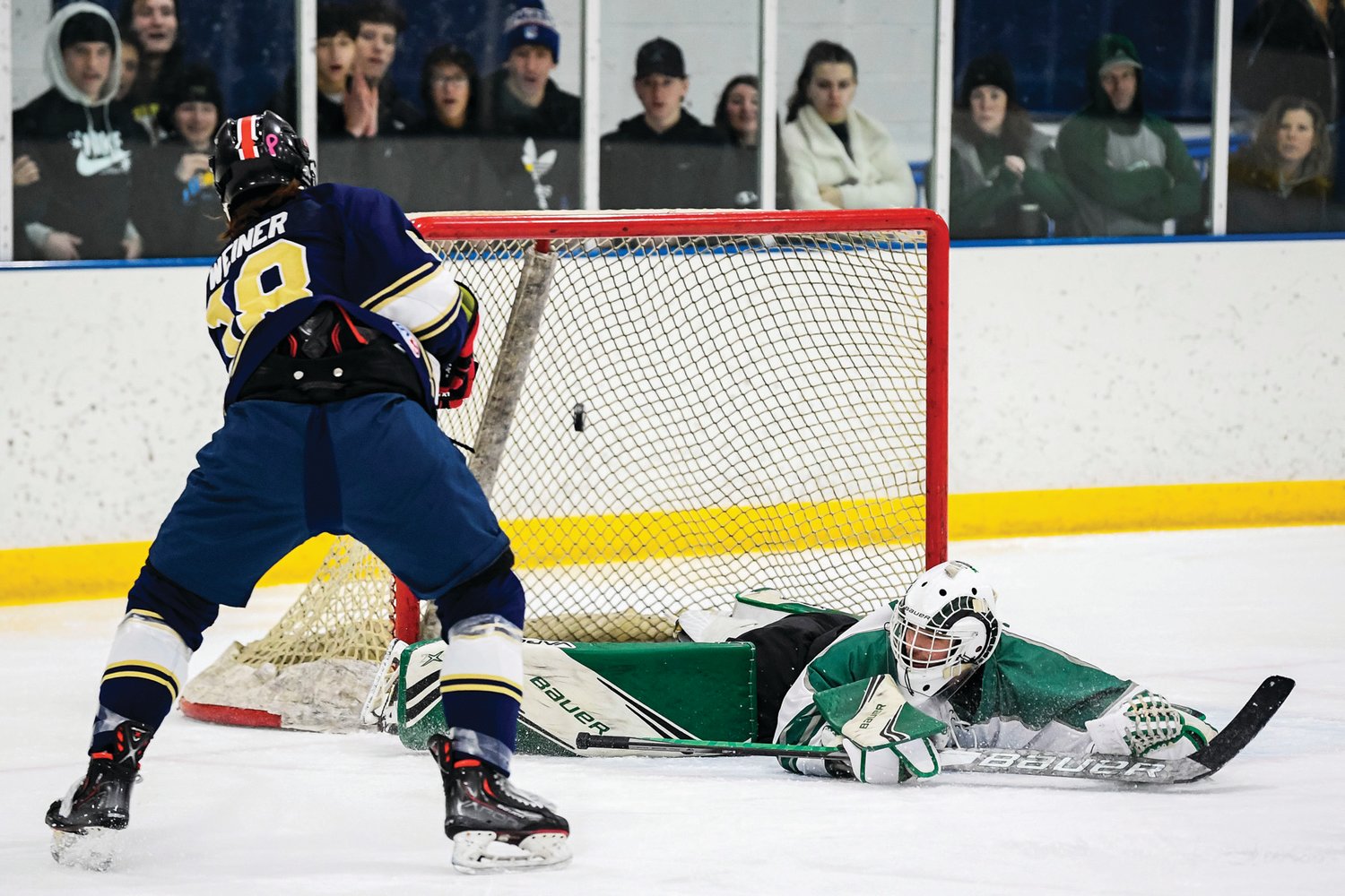 CR South’s Jake Weiner scores the second goal in the first period over a sprawling Jacob Gilbert.