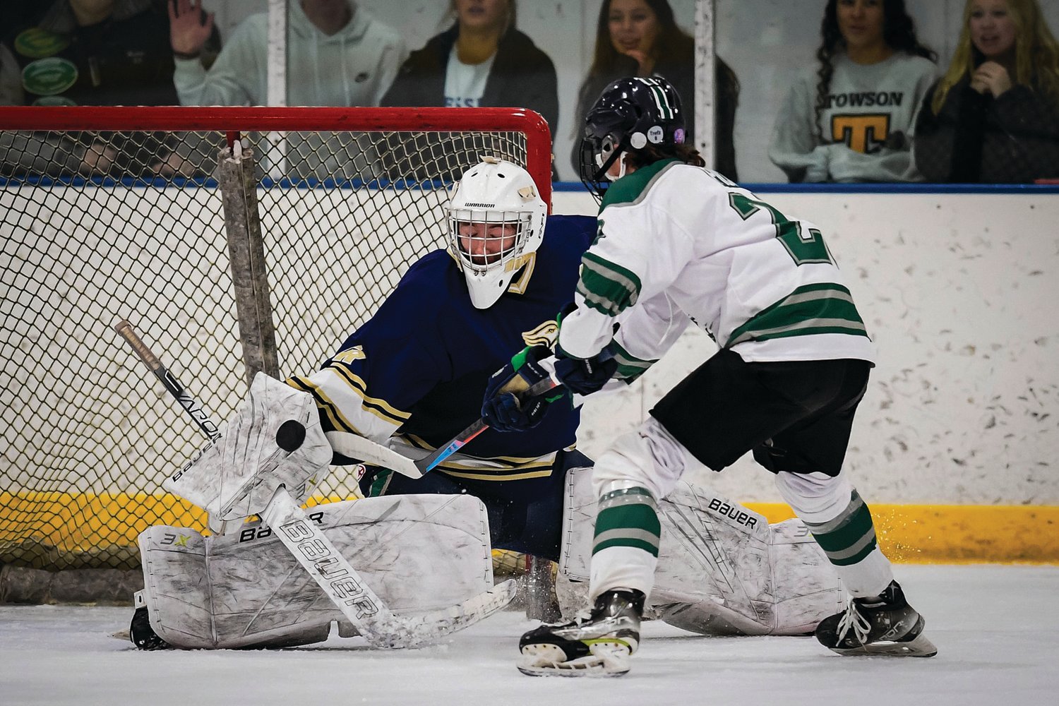 CR South goalie Carson Lopez makes a save on Pennridge’s Kevin Pico with his eyes seemingly closed.