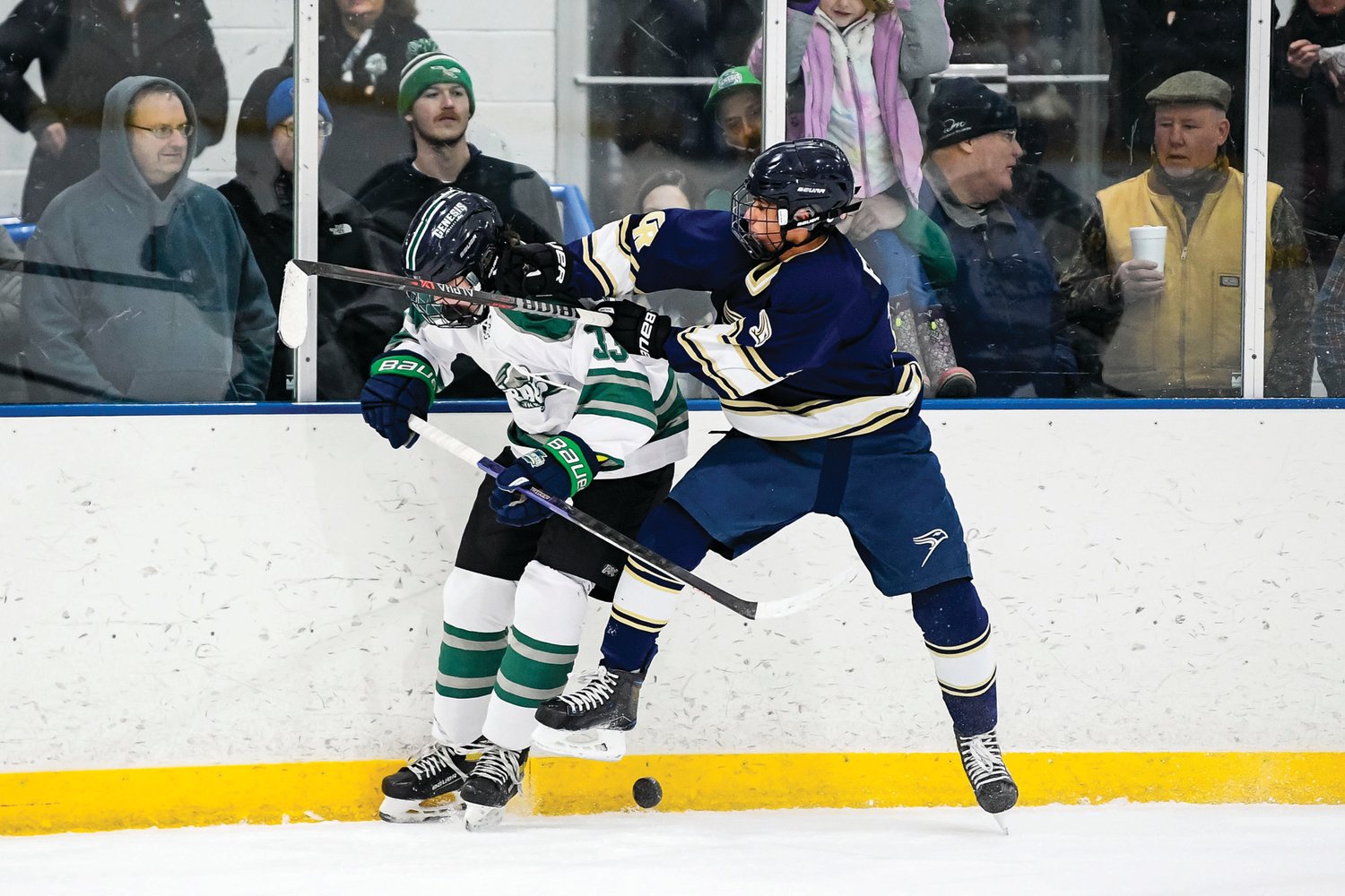 CR South’s Daniel Filippov checks Pennridge’s Joshua Kelly up high while battling for the puck in the second period.