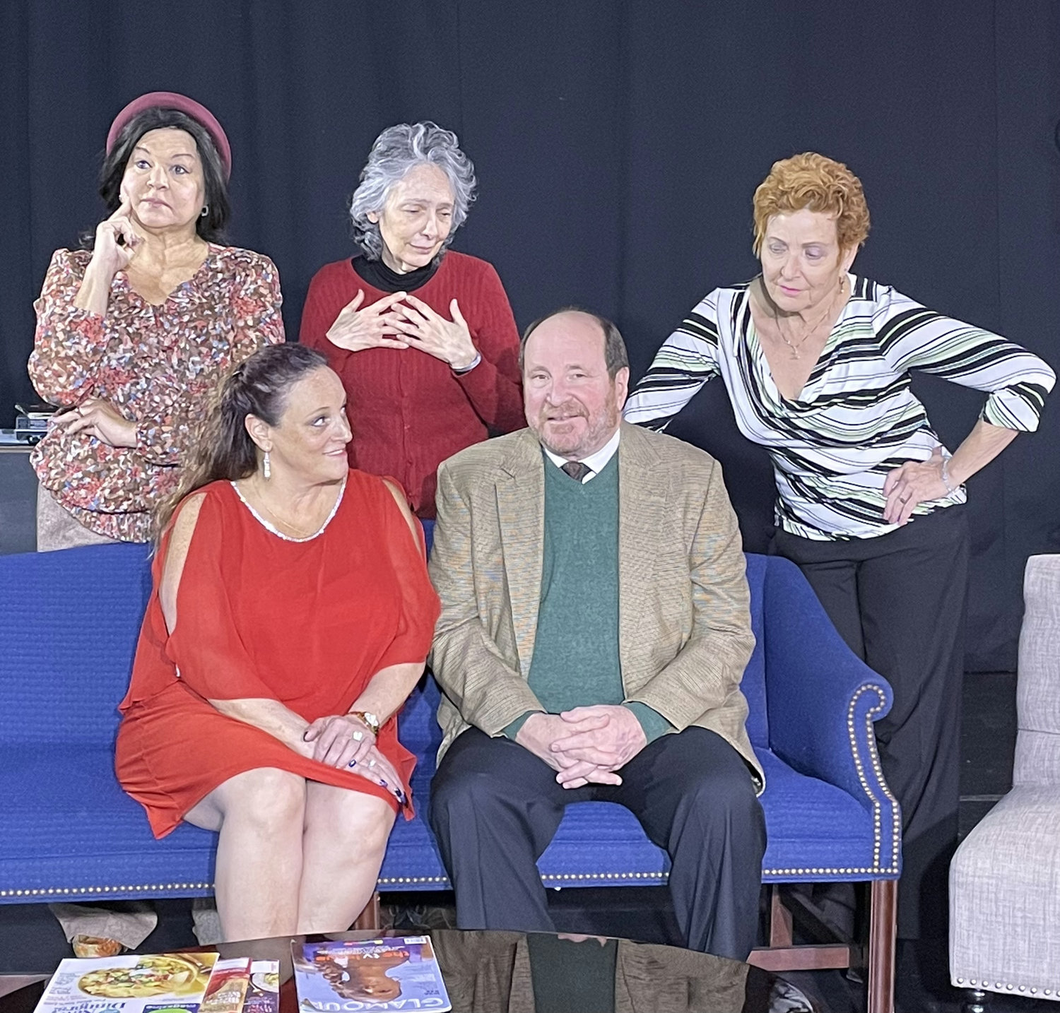 Seated from left are Anita Getz and Jay Steinberg; standing from left are Gina Stevens, Ann D’Silva and Linda Gold.