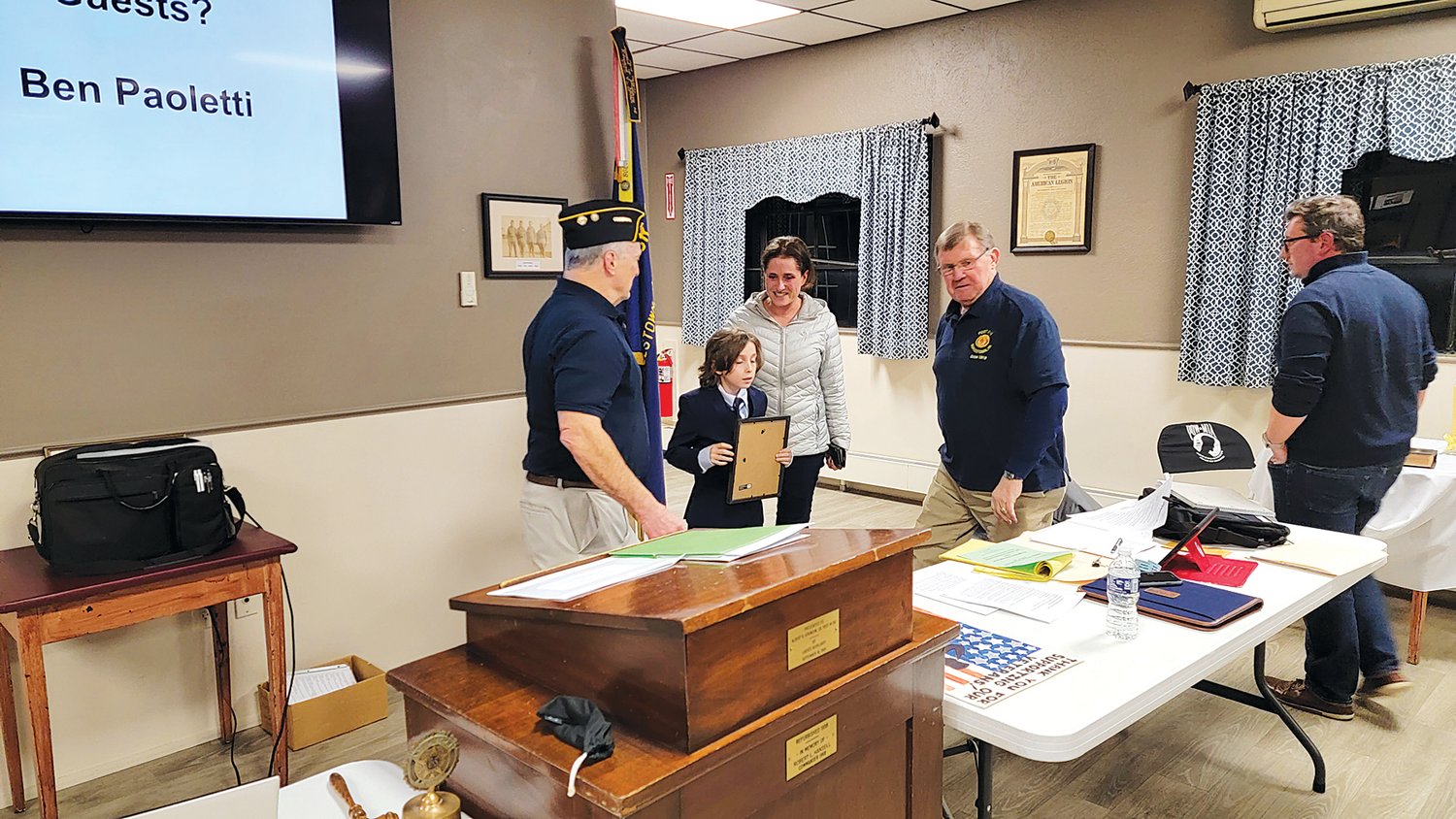 Ben Paoletti, 9, with his parents, Johnathan and Larisa, Peter Scott, commander of Doylestown American Legion Post 210, left, and Ed Lisowski, also of Post 210.