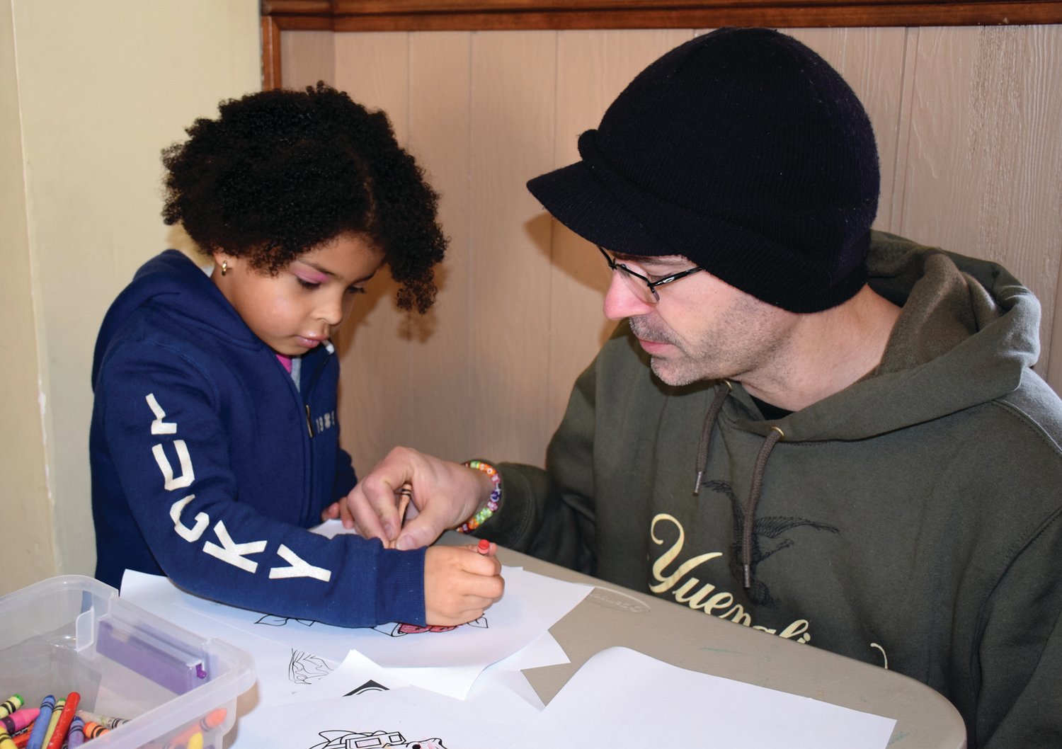 Emma and Josh Seaton, of Telford, work on a coloring page at the Jan. 28 winter market, a “Winter Wanderland” celebration hosted by the Perkasie Towne Improvement Association.