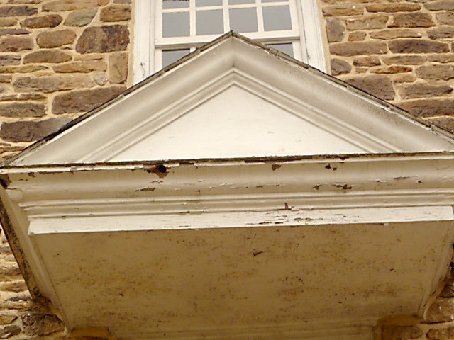 Exterior woodwork is in need of scraping, wood repair and painting.