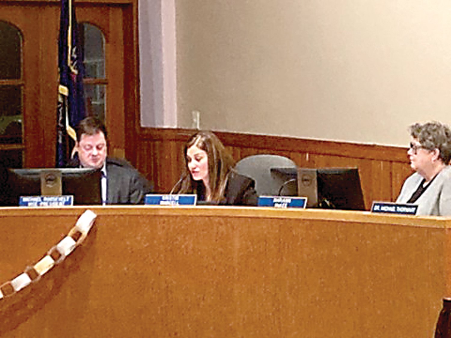 Kristin Marcell, center, delivers her farewell remarks to the Council Rock School Board on Feb. 9 as Mike Roosevelt, left, and Mariann McKee look on. Marcell  is now the state representative for the 178th District in Bucks County.