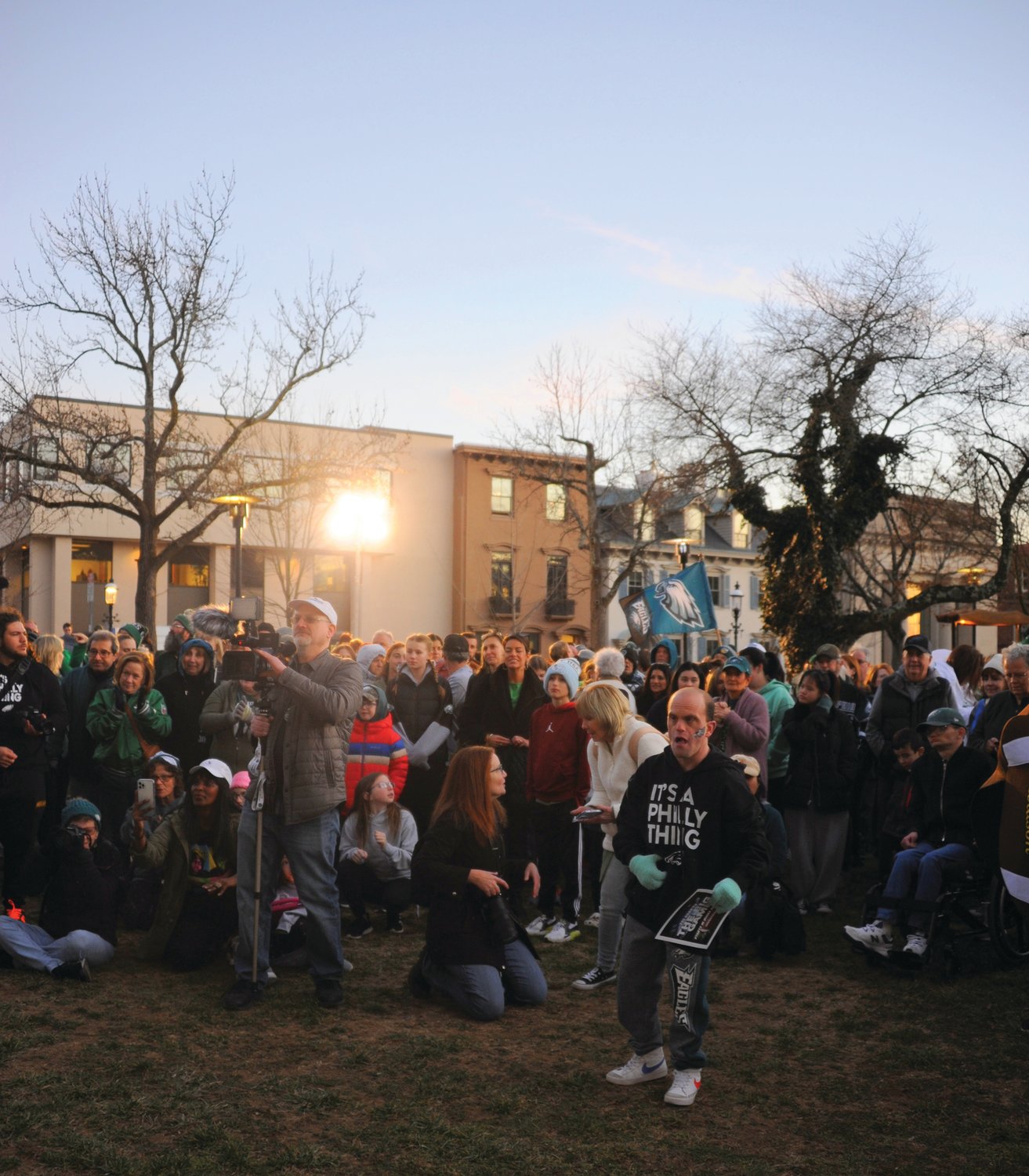 The sun sets at the tail end of the Herald’s “Bucks County Loves the Birds” pep rally on the lawn of the old county courthouse in Doylestown Friday evening. The event drew hundreds of residents to the county seat to kick off Super Bowl weekend.