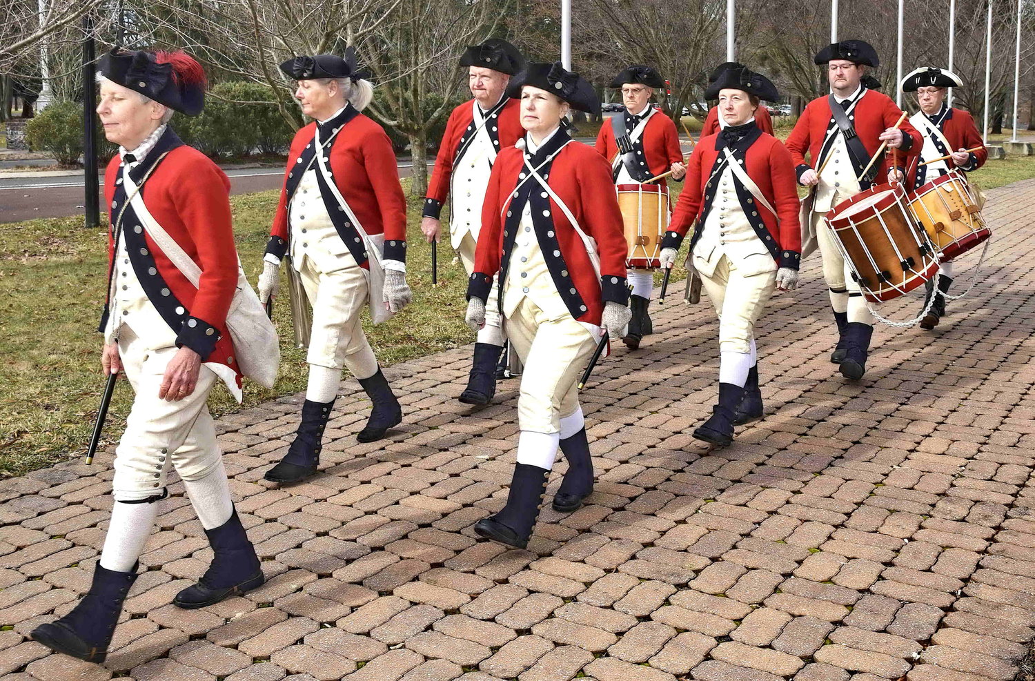 Members of park’s Fife and Drum Corps march.