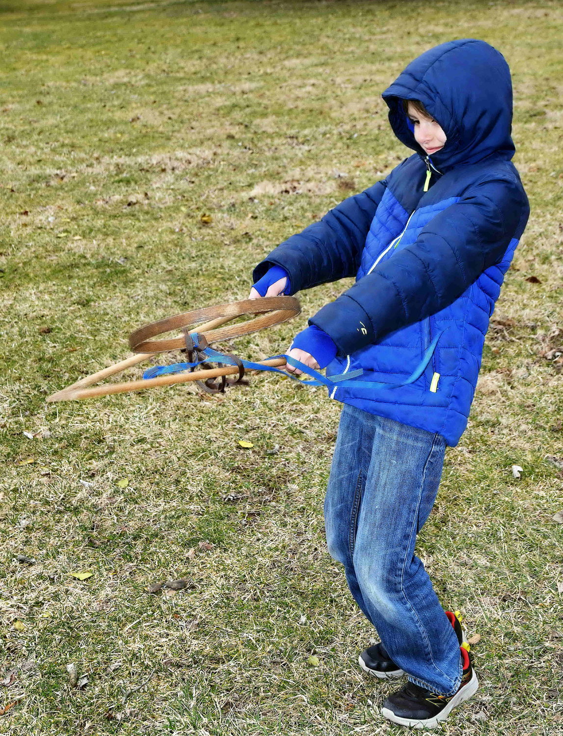 Jeffrey Conover, 11, plays with a Colonial toy.