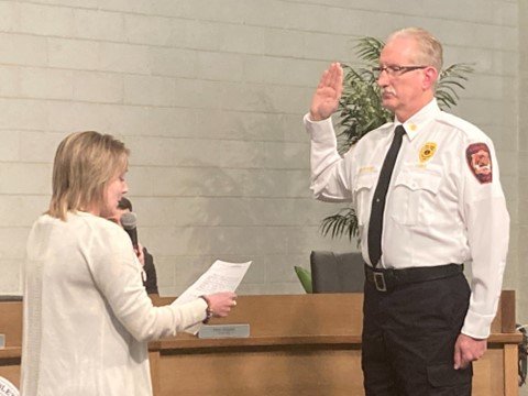 Middletown Township’s new Chief of Fire and Emergency Services Mark Antozzeski is sworn in by Supervisors Chairwoman Anna Payne on Feb. 21.