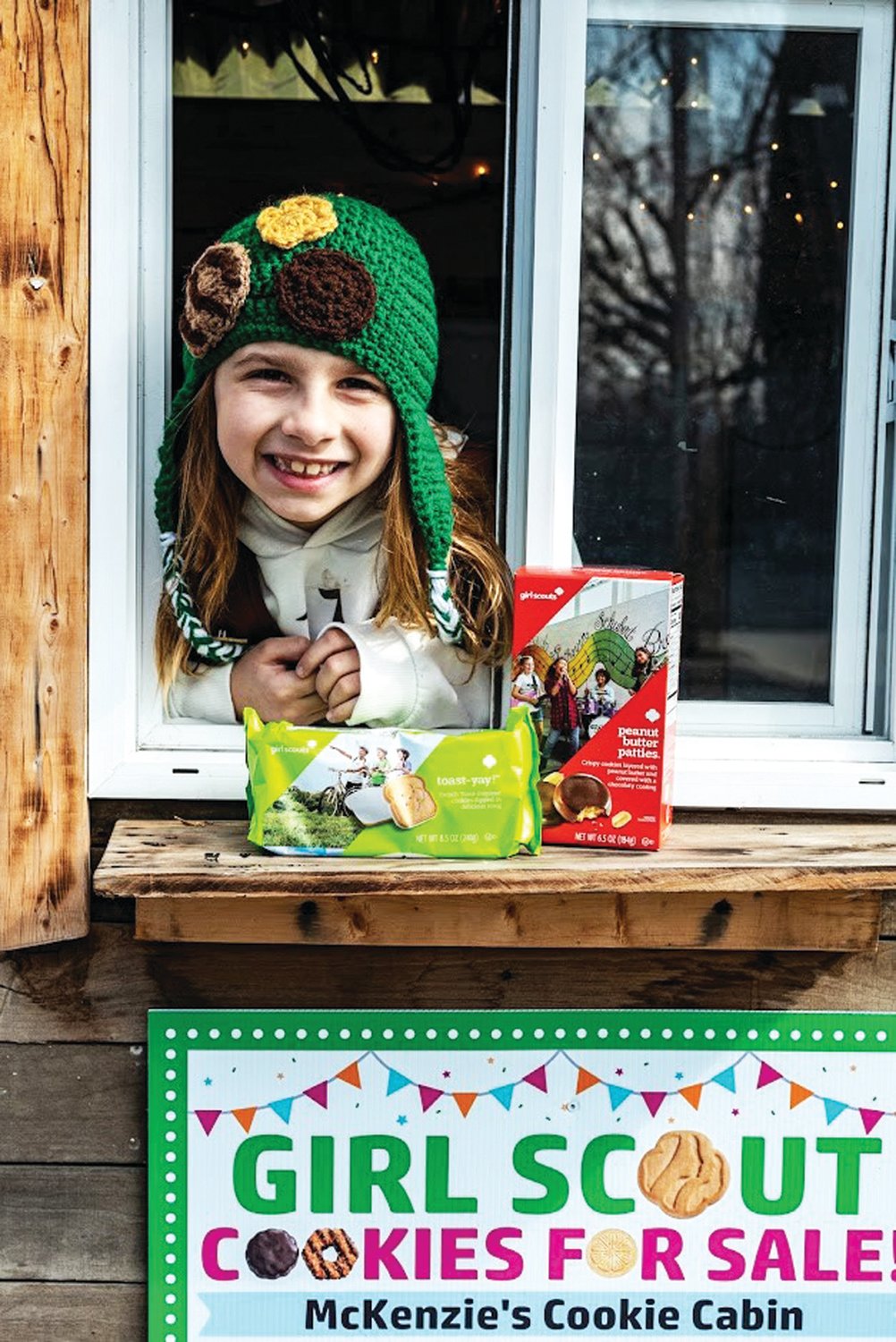 McKenzie Keefe loves her Girl Scout cookie cabin, built by her dad, and loves selling Girl Scout cookies for her Quakertown Brownie troop.