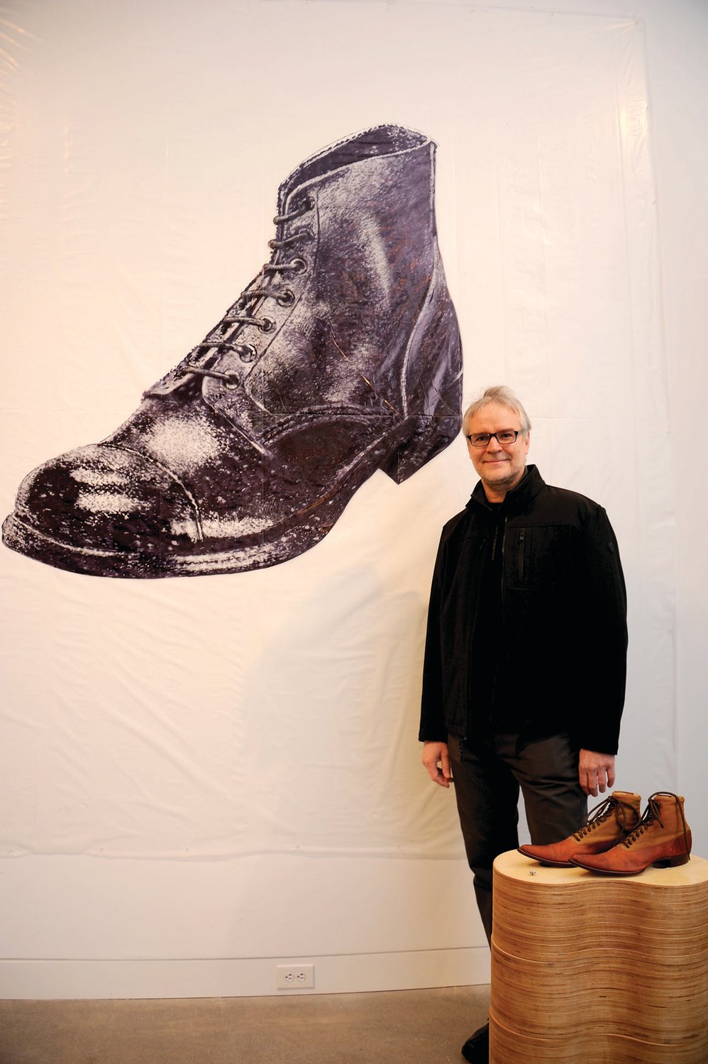 Siemon Allen, artist, in front of his artwork.