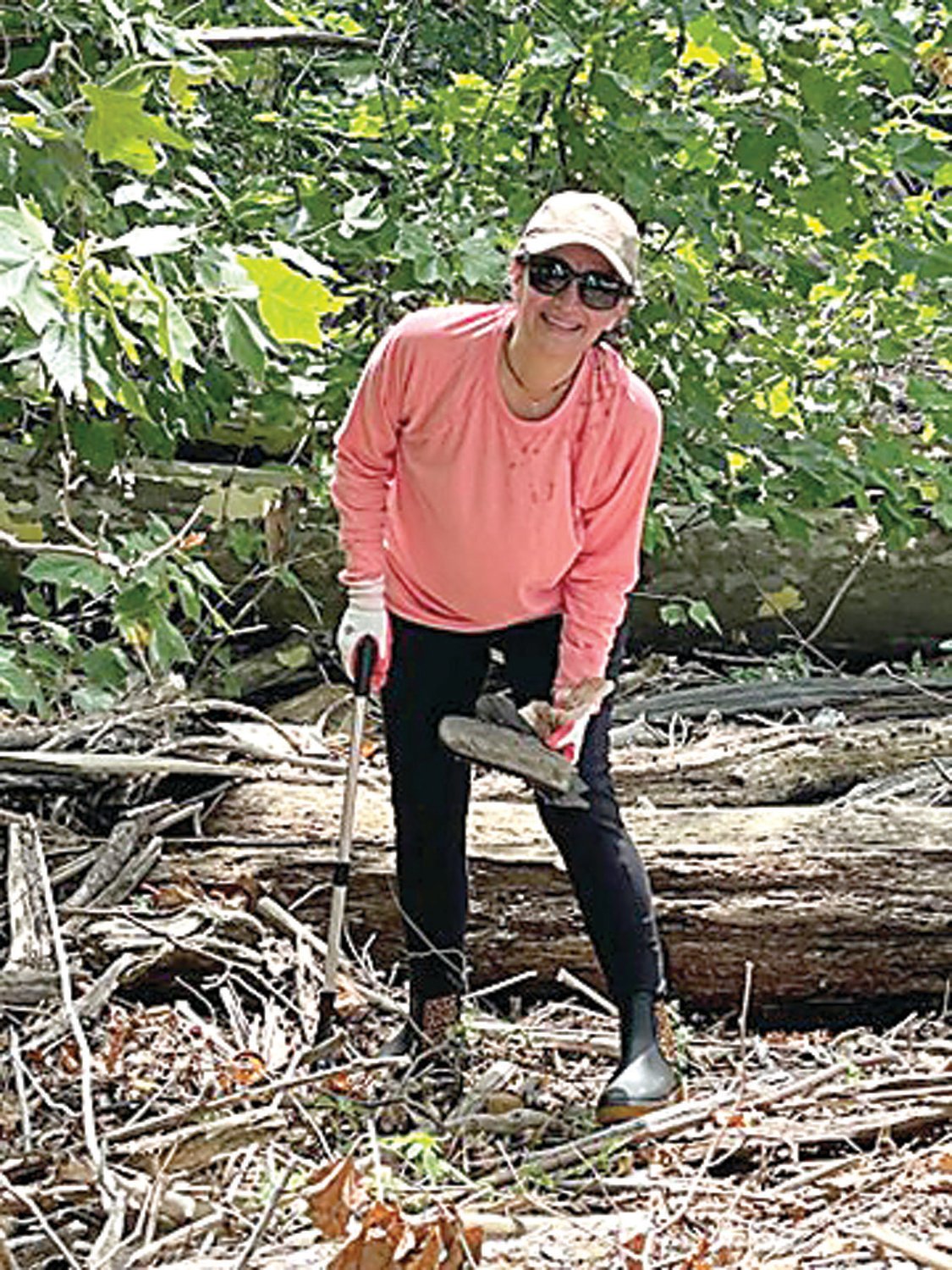 Spearhead Project Earth Head of Global Sustainability Strategies Patricia Burguete pitches in to help with a trial Burlington Island cleanup last year.