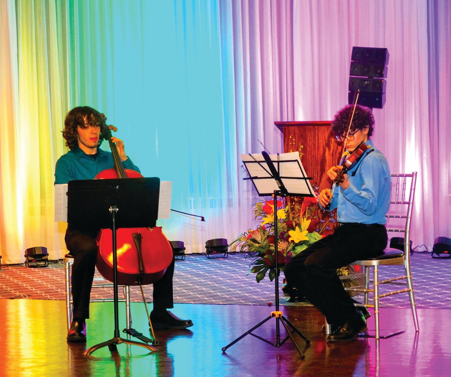 YOBC Honor Strings students Ricky Ridpath, left, and Tony Bello perform at the Youth Orchestra’s annual benefit.