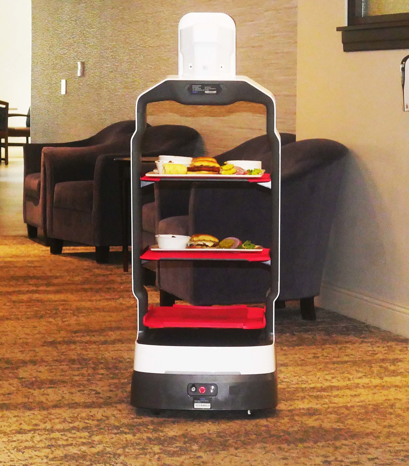 The restaurant at the Wesley Enhanced Living has two robots. Each with little TV-type heads, Robbie and Robin deliver orders to their tables.